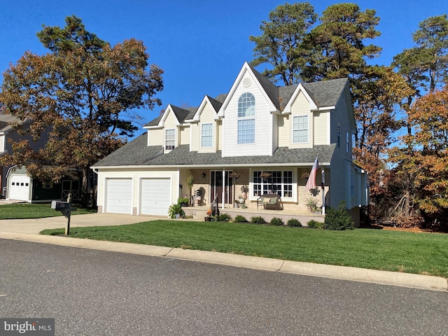 view of front facade featuring covered porch and a front yard