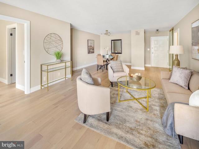 living room with light hardwood / wood-style flooring