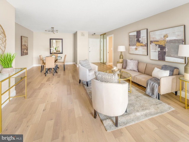 living room with light hardwood / wood-style floors