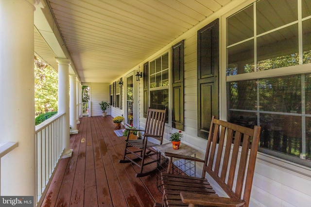 wooden deck featuring a porch