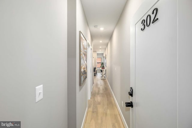 hall featuring light hardwood / wood-style flooring