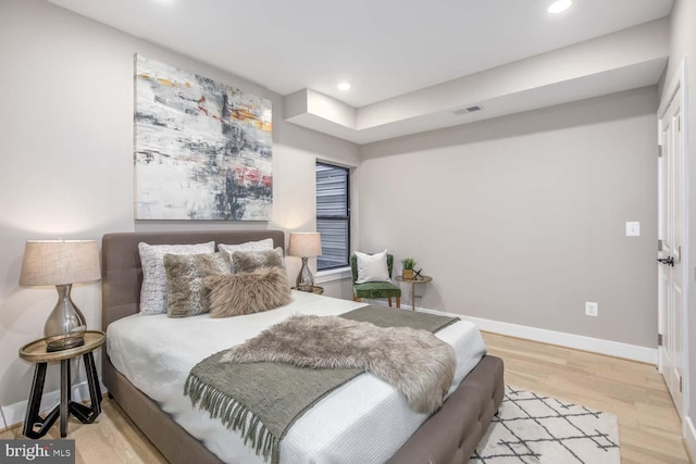 bedroom featuring light hardwood / wood-style flooring