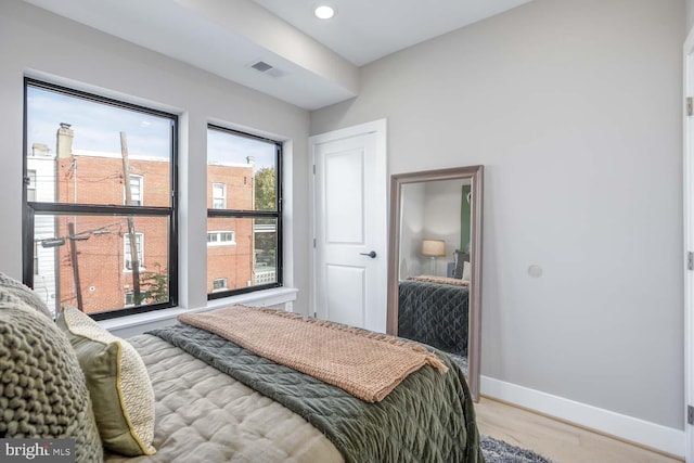 bedroom featuring hardwood / wood-style flooring