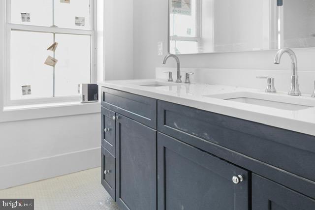 bathroom featuring vanity and plenty of natural light