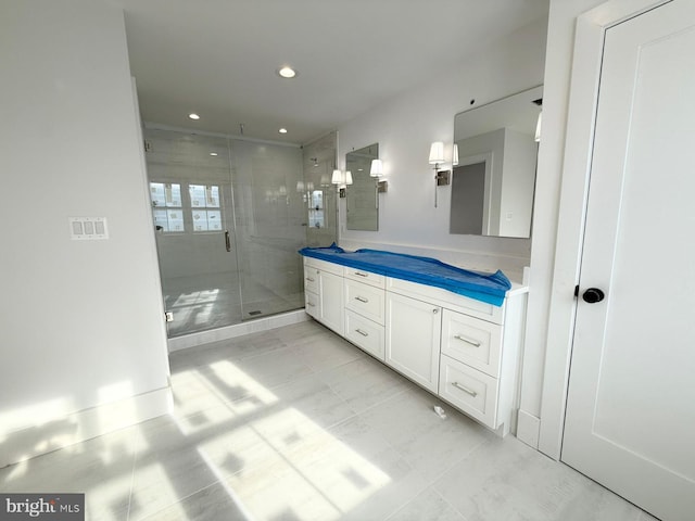 bathroom with vanity and an enclosed shower