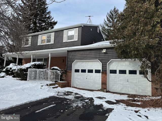 view of front of property with a garage and a porch