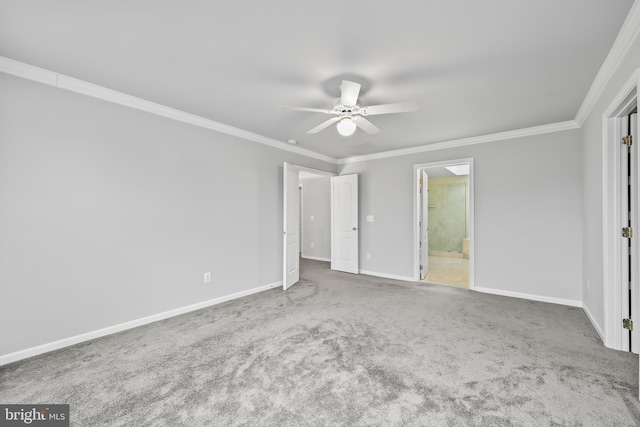 unfurnished bedroom featuring ceiling fan, ornamental molding, carpet flooring, and ensuite bathroom