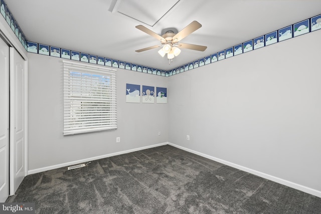 carpeted empty room with ceiling fan