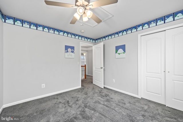 unfurnished bedroom with ceiling fan, carpet floors, and a closet