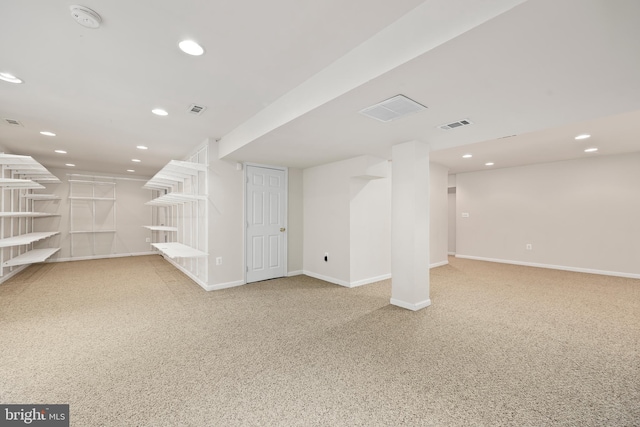 basement with light colored carpet