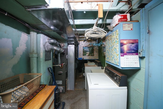 laundry room with laundry area and washer / dryer