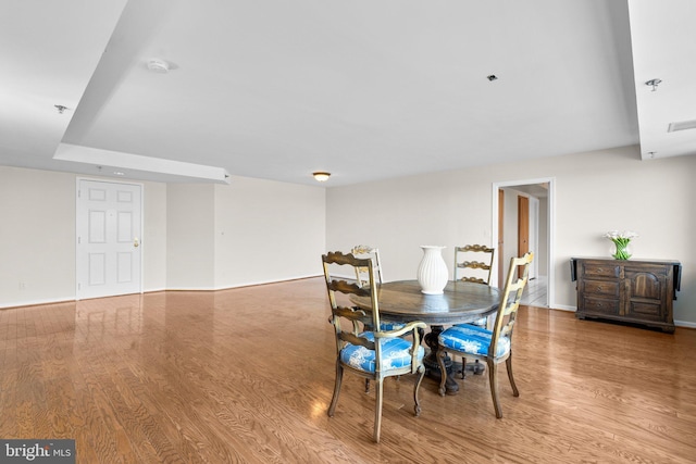 dining room with light hardwood / wood-style flooring