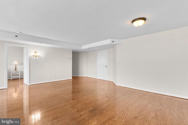 spare room featuring hardwood / wood-style flooring