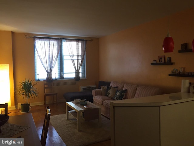 living room with hardwood / wood-style flooring