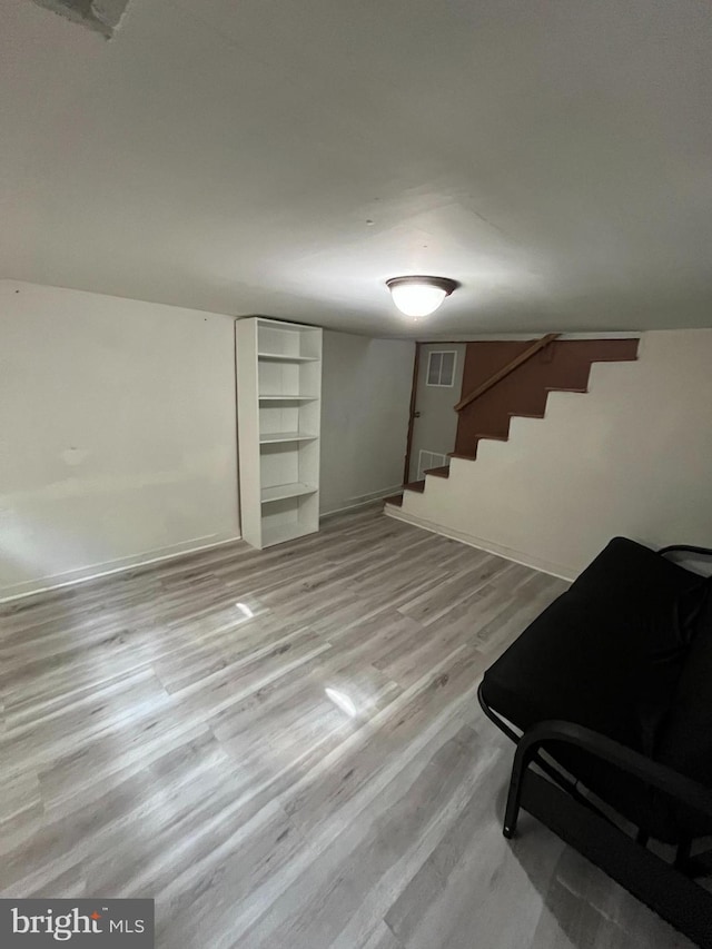 basement with light wood-type flooring