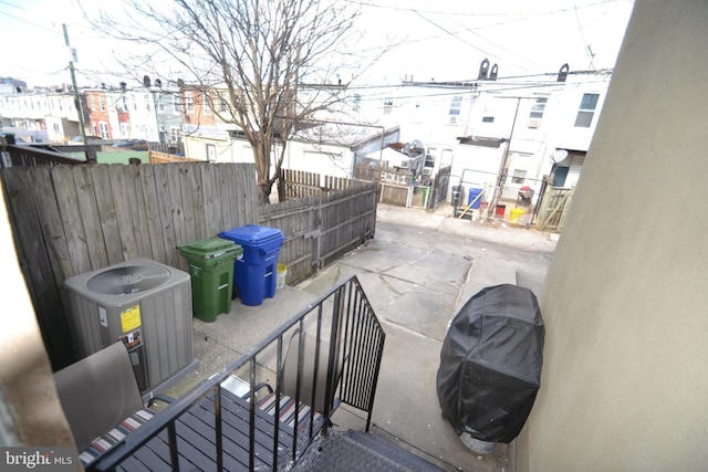 view of patio / terrace featuring grilling area and central AC unit