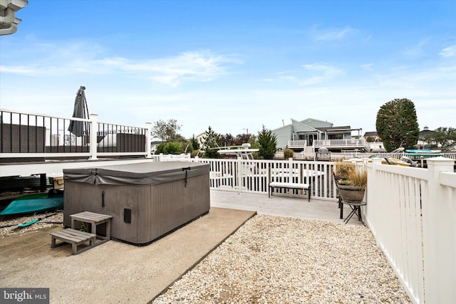 view of patio featuring a hot tub