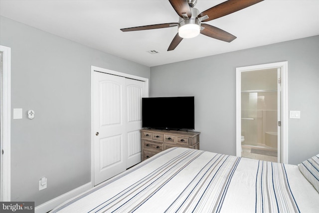 unfurnished bedroom with a closet, ceiling fan, and connected bathroom