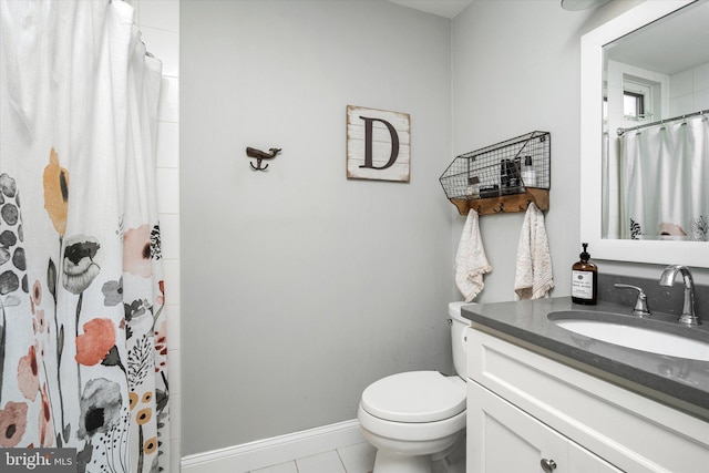 bathroom featuring tile patterned floors, vanity, toilet, and a shower with shower curtain