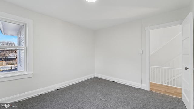 unfurnished room featuring carpet floors