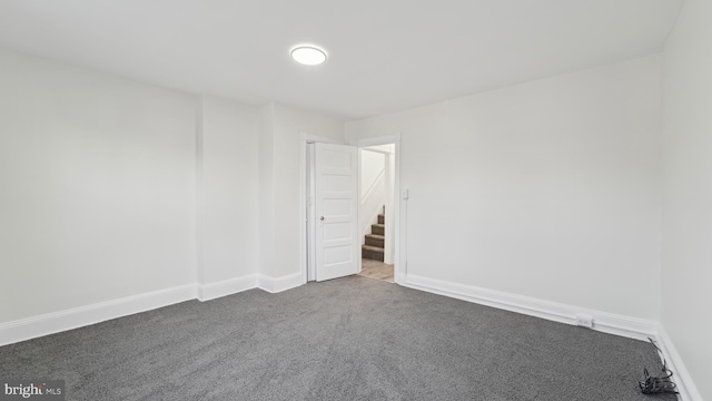 empty room featuring carpet floors