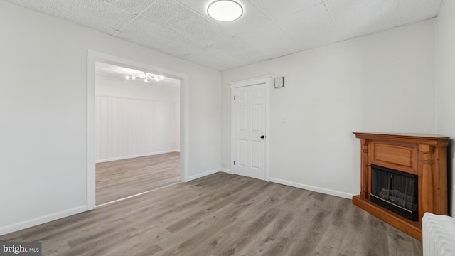 unfurnished living room with light hardwood / wood-style floors