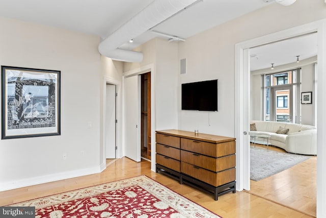 interior space with hardwood / wood-style floors