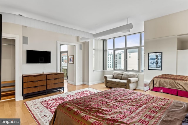 bedroom featuring light wood-type flooring