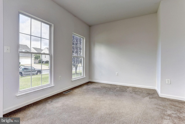 view of carpeted spare room