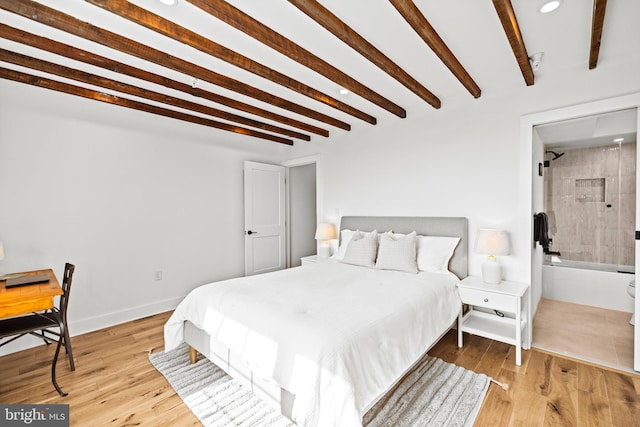 bedroom featuring beamed ceiling and light hardwood / wood-style flooring