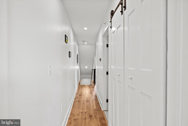 corridor featuring light wood-type flooring