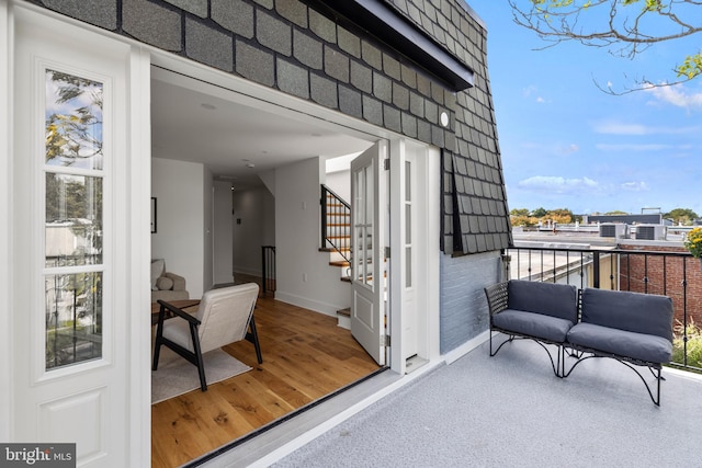 entrance to property with a balcony