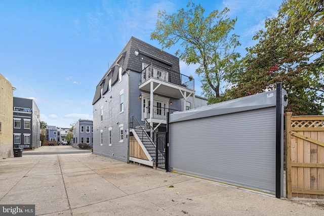 exterior space featuring a balcony