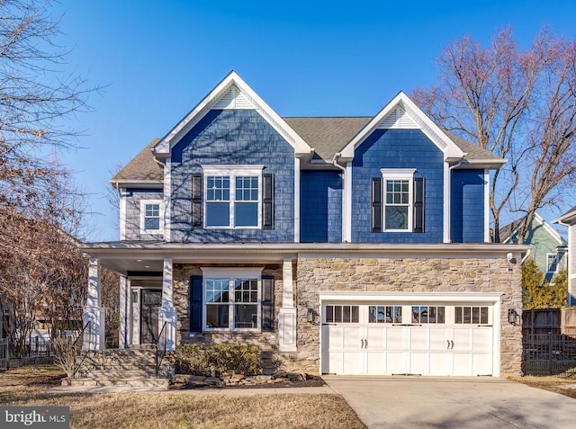 view of front of property featuring a garage