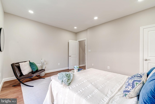 bedroom featuring hardwood / wood-style flooring