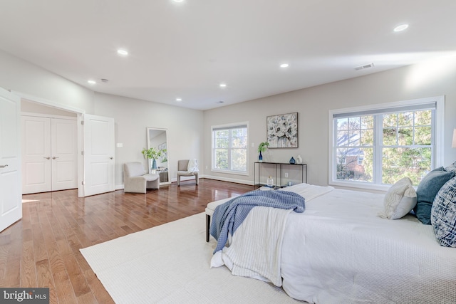 bedroom with light wood-type flooring