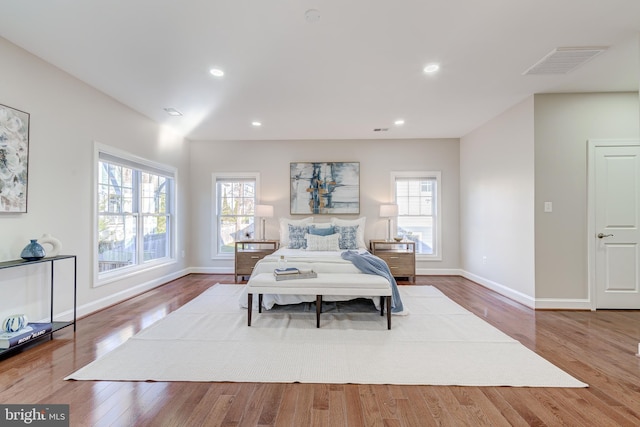 bedroom featuring wood-type flooring