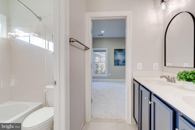 full bathroom with vanity, shower / bathing tub combination, tile patterned floors, and toilet