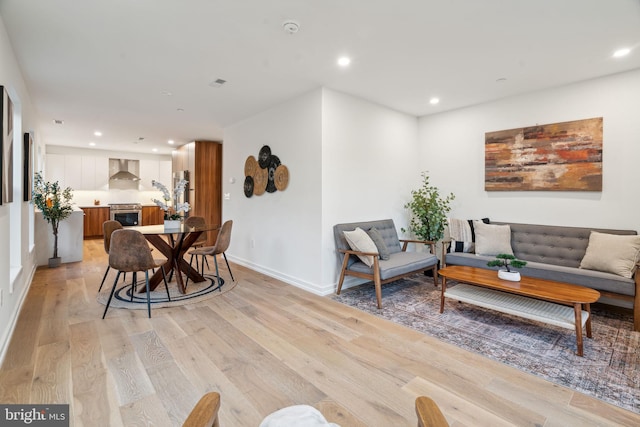 living room featuring light wood-type flooring