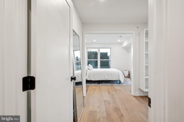 bedroom featuring light wood-type flooring