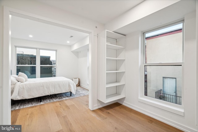 bedroom featuring hardwood / wood-style floors