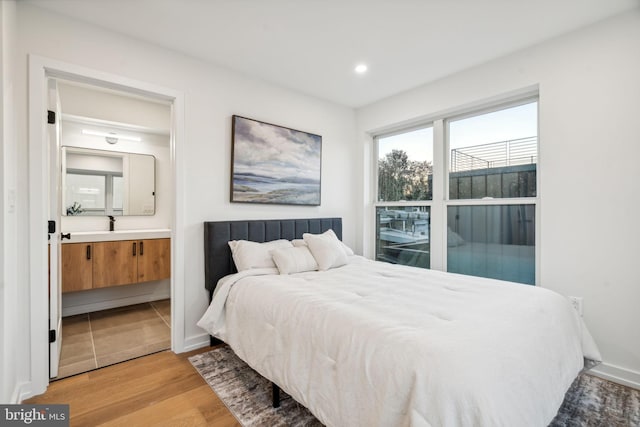 bedroom featuring light wood-type flooring