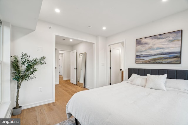 bedroom featuring light wood-type flooring