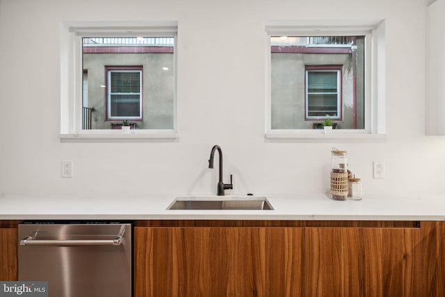 interior space featuring sink and dishwasher