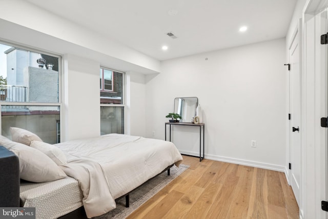 bedroom featuring light wood-type flooring