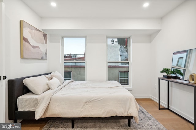 bedroom with light hardwood / wood-style flooring