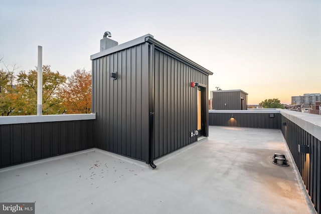 view of outdoor structure at dusk