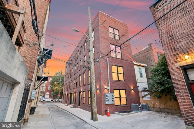 outdoor building at dusk with central AC