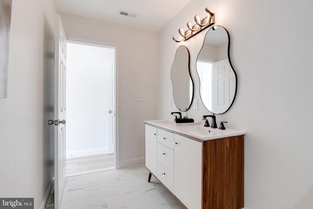 bathroom featuring vanity