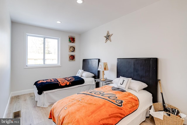 bedroom featuring light wood-type flooring